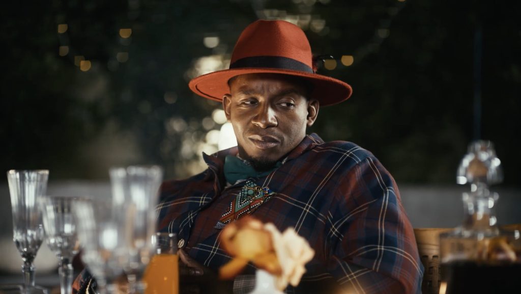 Lawrence as Mzi in Critical But Stable