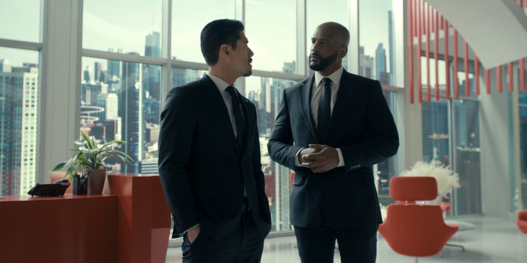 Bryan Tanaka as Officer Alex and George Middlebrook as Officer Trackson in Beauty in Black Season 3
